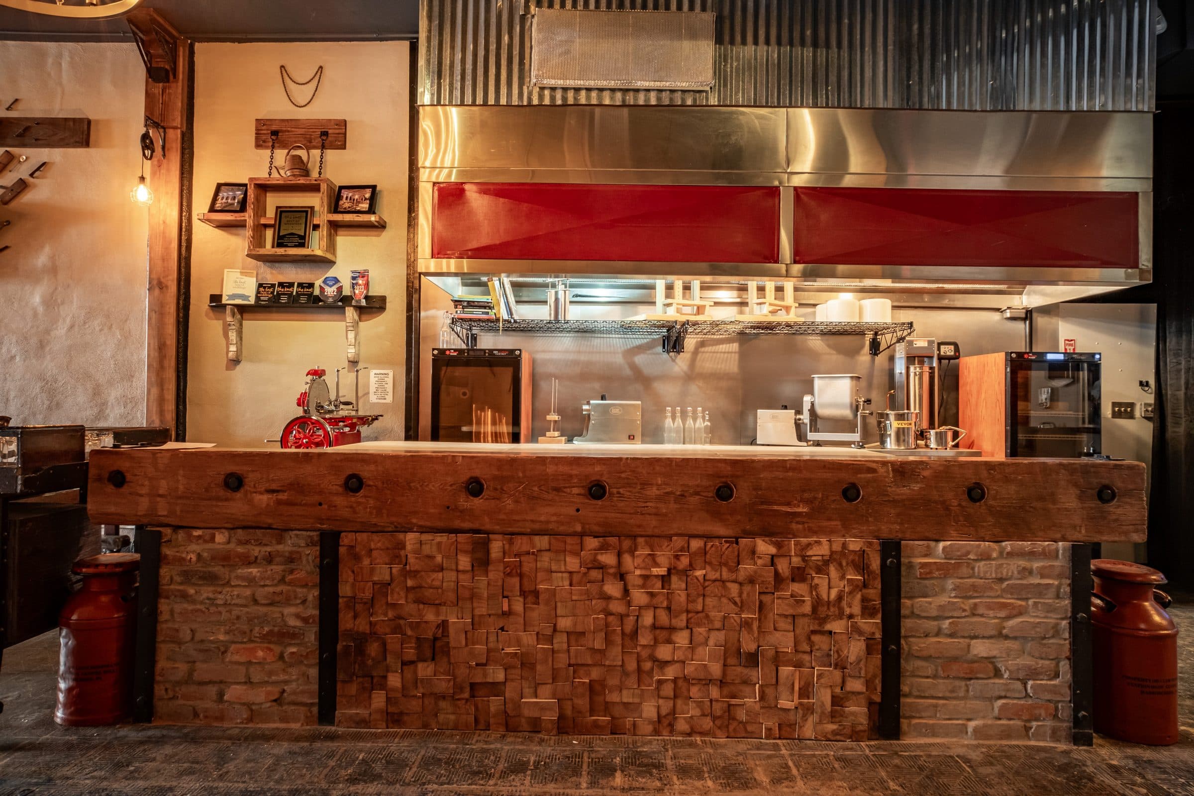 Lot 77 Provisions counter where charcuterie is cut and cocktails are poured